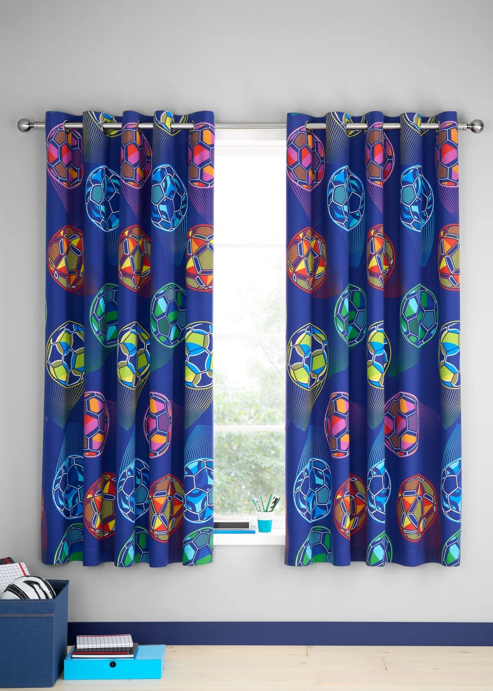 Catherine Lansfield Bright Football Fully Reversible Eyelet Curtains Navy Blue - 66W X 72D (168x183cm) Image 2