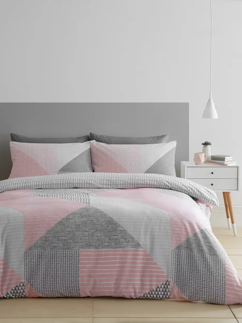 Catherine Lansfield Larsson Geo Reversible Duvet Cover Set Pink - Single Image 1