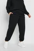 Yours Curve Black Cuffed Joggers - 30-32 Image 1