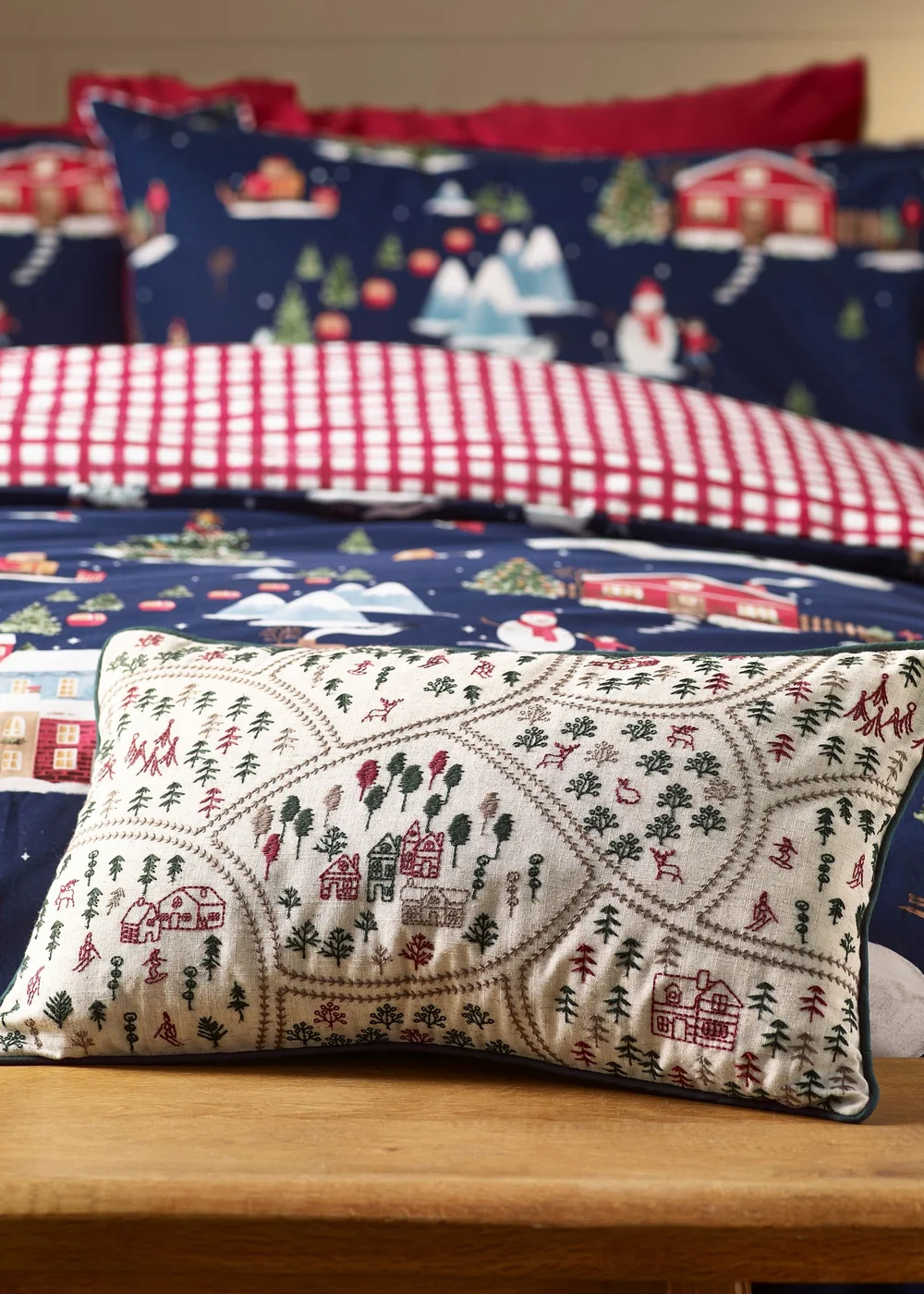 Catherine Lansfield Natural Christmas Ski Village Embroidered Cushion - 30 x 50cm Image 1