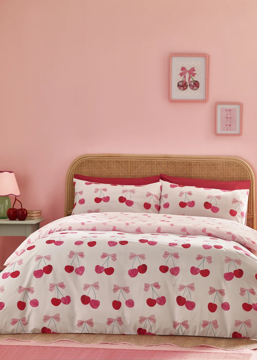Catherine Lansfield Cherries and Bows Reversible Duvet Cover Set Pink - Single Image 1