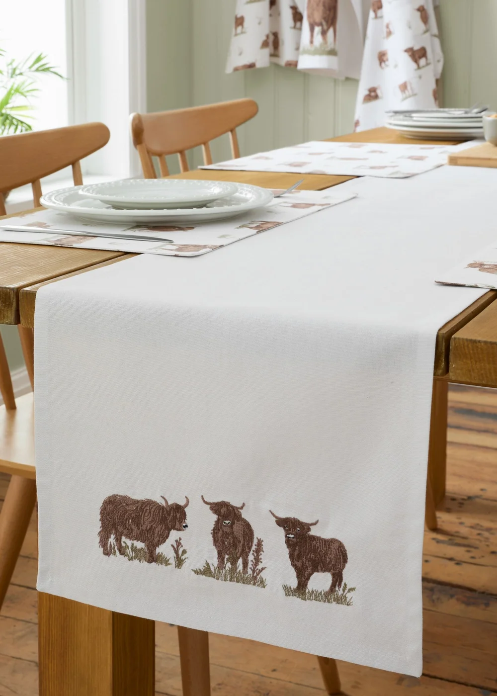 Catherine Lansfield Angus Highland Cow Cotton Dining Table Runner Natural - One Size Image 1