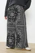 Yours Curve Black Paisley Wide Leg Trousers - 20 Image 1