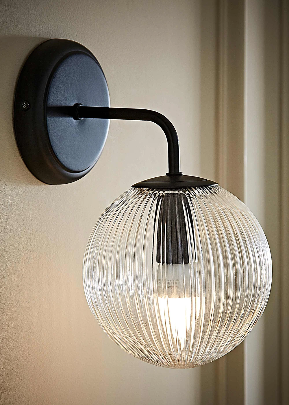 ValueLights Kempton Matte Black Wall Light with Ribbed Globe Shade - One Size Image 1