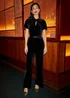 Yumi Black Velvet Jumpsuit With Twist Neckline & Buckle Belt - 16 Image 1
