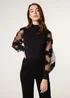 Blue Vanilla Black Turtle Neck Jumper With Mesh Polka Dot & Flower Detailed Sleeves - Medium Image 1