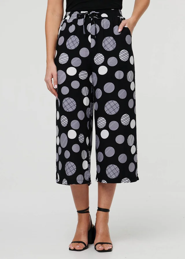 Izabel London Black Spotty Print Tie Waist Cropped Trousers