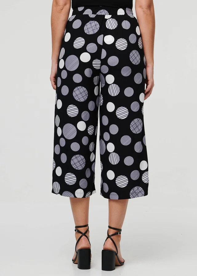 Izabel London Black Spotty Print Tie Waist Cropped Trousers