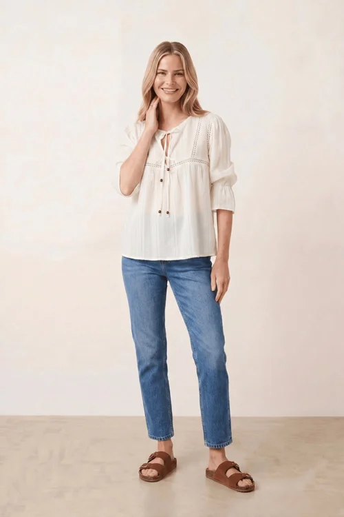 Style Cheat Tiered White Tie Textured Blouse - 10 Image 1