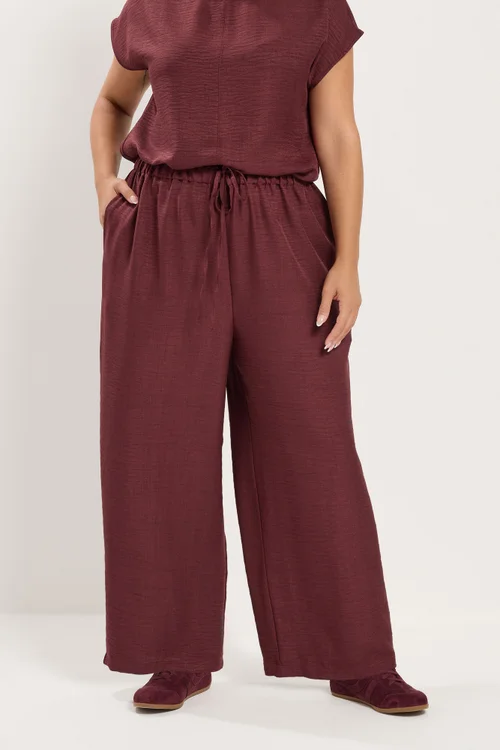 Yours Curve Wine Red Textured Wide Leg Trousers - 16 Image 1