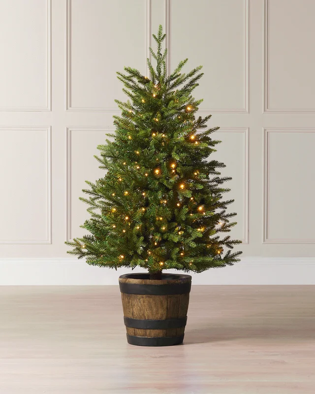 WeRChristmas Green Pre-Lit Potted Pine Artificial Christmas Tree 100 Warm White And Multi-Colour Leds 4 Ft