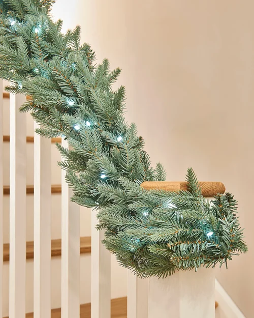 WeRChristmas Blue Pre-Lit Mixed Pine Artificial Christmas Garland 100 Warm White And Ice White Leds 9 Ft - No Size Image 4
