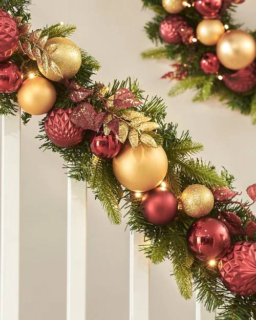 WeRChristmas Multi-Colour Pre-Lit Artificial Christmas Garland With Burgundy And Gold Baubles 100 Warm White Leds 9 Ft - No Size Image 1