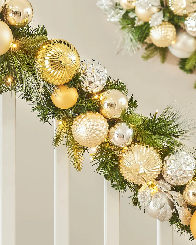 WeRChristmas Multi-Colour Pre-Lit Artificial Christmas Garland With Silver & Gold Baubles 100 Warm White Leds 9 Ft