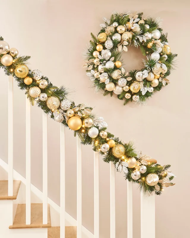 WeRChristmas Multi-Colour Pre-Lit Artificial Christmas Garland With Silver & Gold Baubles 100 Warm White Leds 9 Ft