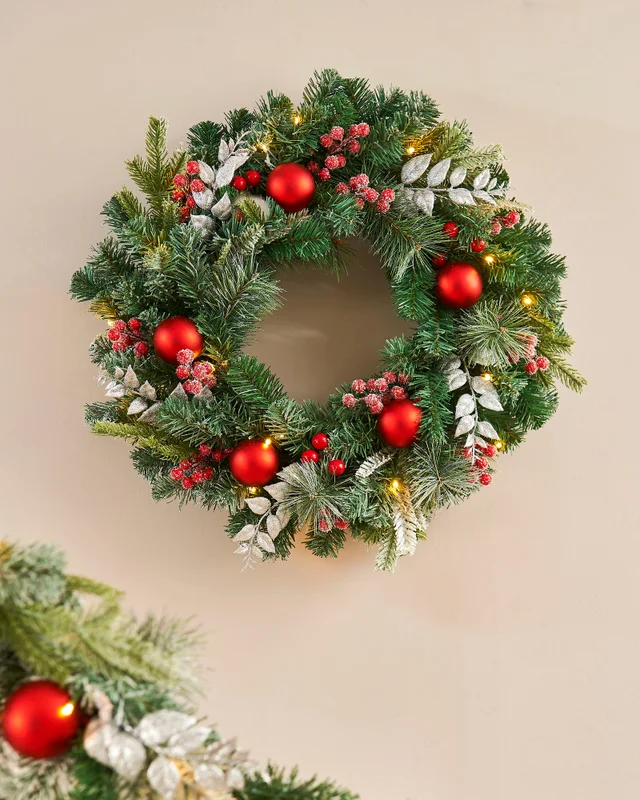WeRChristmas Multi-Colour Pre-Lit Frosted Red & White Decorated Artificial Christmas Wreath 20 Warm White Leds 60 Cm