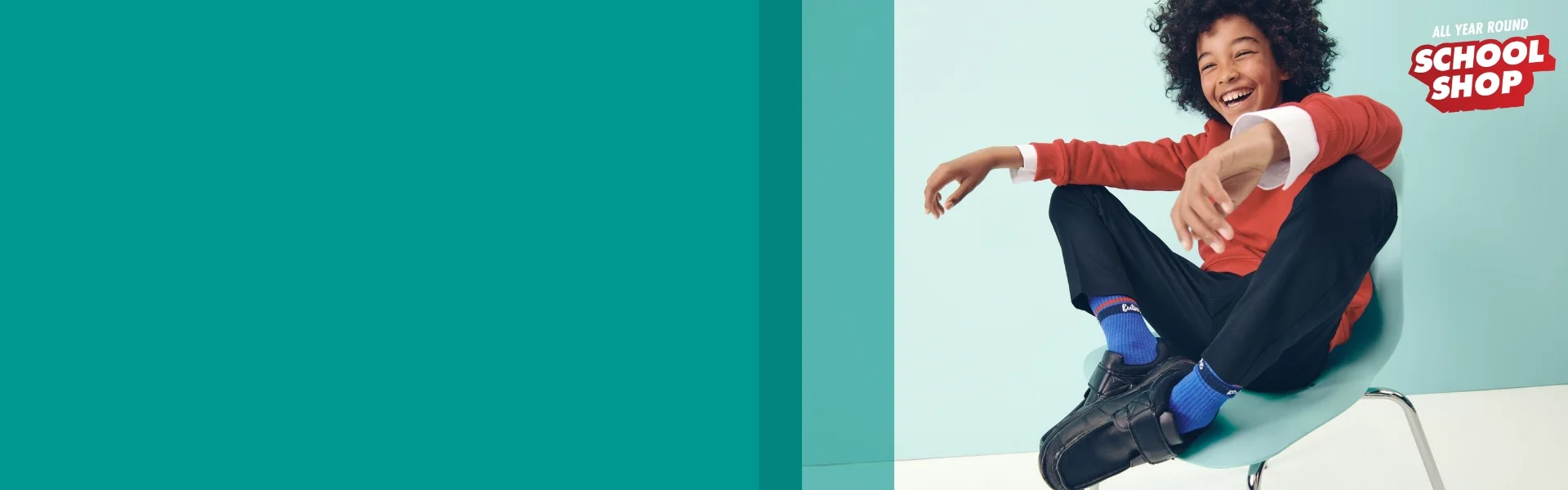 Boy wearing school uniform and loop and chain school shoes